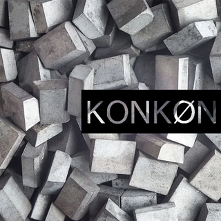 A pile of oxidized tungsten cubes, KONKØN punch out title on the left